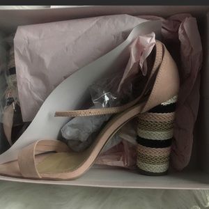 Ladies size 12 multi colored heels.  Brand New!